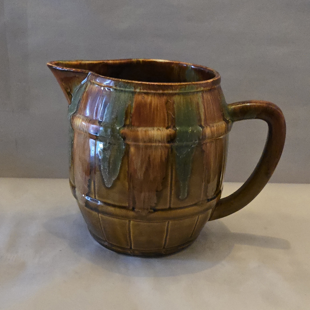 Handcrafted Brown Ceramic Pitcher with Green Drip Glaze